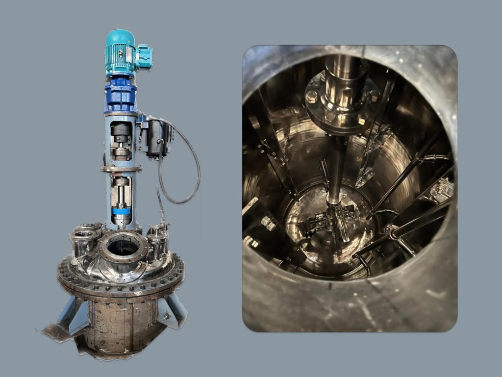 Industrial agitator assembly with motor and mechanical seal, manufactured by Raviraj Engineering.